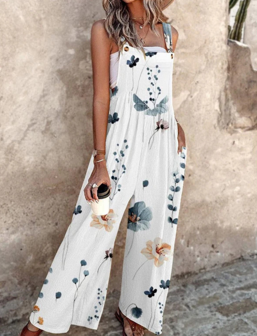 Indira™ - Sleeveless jumpsuit with plant print for a fresh and elegant summer look