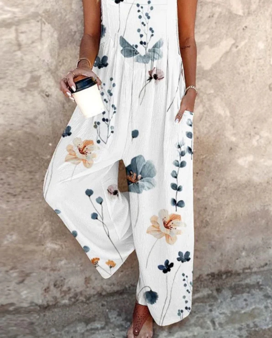 Indira™ - Sleeveless jumpsuit with plant print for a fresh and elegant summer look